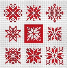 cross stitched snowflakes in red and white