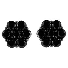 You will fall in love with these classic cluster stud earrings. A must have for any serious jewelry collection, these .925 sterling earrings boast an impressive 1/2 carat total weight of treated black diamonds with seven stones each. The earrings are floral clusters with seven round, brilliant cut diamonds in shared prong settings. The earrings have stacked open galleries. The stud style earrings have pushback closures. These classic, elegant floral cluster stud earrings make a great gift for an Black Diamond Earrings Studs, Black Diamond Earrings, Floral Studs, Stud Style, Unique Diamonds, Earring Findings, 925 Sterling Silver Earrings, 2 Carat, Stud Earring