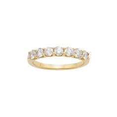 Surprise her with the exquisite elegance of this 14k gold wedding ring. A row of round-cut diamonds give it dazzling beauty she's sure to love. Click on this JEWELRY & WATCHES GUIDE to learn about fit, styles, materials and more!RING DETAILS Width: 3.5 mm Metal: 14k gold DIAMOND DETAILS IGL certified Total weight: 1 ct. Shape: round Color grade: H-I Clarity: I1 Setting: prong Image(s) may be enlarged to show detail.Diamond weights are approximate. Diamond total weights may vary between .01 and . Classic Half Eternity Ring For Marriage, Classic Round Eternity Wedding Ring, Classic Round Half Eternity Wedding Ring, Yellow Gold Half Eternity Round Cut Wedding Ring, Yellow Gold Diamond Ring For Marriage With Prong Setting, Brilliant Cut Diamond Ring For Marriage, Brilliant Cut Round Rings For Marriage, Yellow Gold Round Cut Bridal Sets, Luxury Yellow Gold Bridal Sets