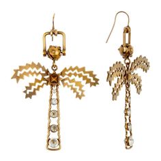 Dangling Antique Gold Finish Earrings Adorned With Crystals Gorgeous Unique Earrings With Valentino’s Signature Detailing Dangling Palmtrees Roller Ball At Top With French Hook Back Unique Edgy Palm Fronds With Center Signature Rock Stud Trunk Embellished With Crystals Antique Gold Tone Finish Materials: Metals, Crystals Imported Tags, Jewelry Bag Really Great Looking Designer Jewelry For Party, Designer Pierced Dangle Jewelry, Luxury Silver Brass Earrings, Designer Metal Jewelry With Matching Earrings, Valentino Jewelry, Palm Fronds, Roller Ball, Jewelry Bag, Jewelry Bags