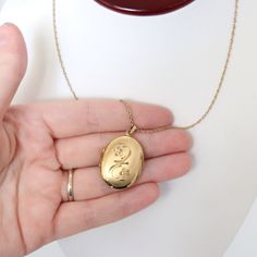 "Please note we ship on Tuesdays and Fridays only due to living in a Rural community. THIS ITEM IS NOT GOLD PLATED THIS ITEM IS VINTAGE OR ANTIQUE GOLD FILLED or ROLLED GOLD. PLEASE READ THE EXPLANATION FOR VINTAGE OR ANTIQUE GOLD FILLED AND ROLLED GOLD JEWELLERY BELOW THE DESCRIPTION Vintage c1950s 12k Gold Filled Oval Locket Etched Violets & Chain The locket is in very good vintage condition. No dings or dents. Opens and snaps shut securely. The locket is hallmarked and signed on the inside 12k gf and Winard (Winard USA 1937-1956) The locket has a mirror gold finish back and the front is slightly brushed gold with a mirror finish rim and etched violet flowers and foliage. The locket is 3cms by 2.5cms not including the bail. The chain is 57cms or just over 22 inches long and the total wei Gold Engraved Jewelry For Vintage Events, Engraved Gold Jewelry For Vintage Events, Antique Oval Jewelry For Vintage Events, Vintage Yellow Gold Hallmarked Jewelry, Retro Gold Jewelry Stamped 14k, Engraved Oval Jewelry For Vintage Events, Vintage Wedding Jewelry With Hallmarks, Classic Yellow Gold Jewelry From Vintage Collection, Vintage Gold Jewelry With Hallmark