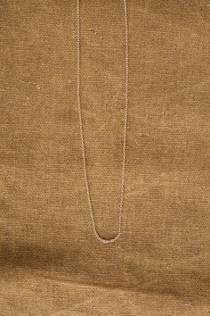 Delicate and simple chain necklace 14K Yellow Gold 16" Spring clasp .5mm width Handle with care Made in California Designer: Kathleen Whitaker | Learn more about the Designer and shop the collection. Classic Charm Necklace With Delicate Chain For Everyday, Classic Rose Gold Charm Necklace With Delicate Chain, Classic Rose Gold Chain Necklace With Delicate Chain, Delicate Rolo Chain Necklace For Everyday, Delicate Rolo Chain Necklace, Classic Delicate Rose Gold Chain Necklace, Classic Rose Gold Delicate Chain Necklace, Dainty Everyday Rolo Chain Necklaces, Classic White Gold Charm Necklace With Cable Chain