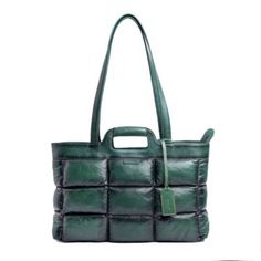 The design of this tote is a perfect blend of beauty and practicality. Its plush contours, reminiscent of clover leaves, exude a softness and charm that make it an instant conversation starter. The elegant color palette, chosen to complement a wide range of outfits, adds versatility to this fashionable piece. Whether attending a high-profile event or enjoying a casual day out, the Puffy Clover Tote adapts to your style, enhancing and elevating your ensemble. Its craftsmanship is evident in every Green Quilted Square Bag, Square Green Quilted Bag, Green Quilted Shopping Bag, Chic Quilted Green Bags, Chic Green Quilted Bag, Everyday Green Quilted Bag, Green Quilted Bag For Daily Use, Green Quilted Tote Shoulder Bag, Elegant Color Palette