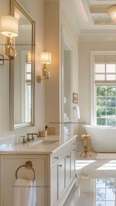 a bathroom with a tub, sink and large mirror in it's center area