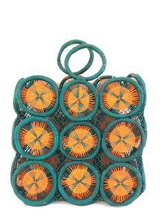 "This is a Gorgeous vintage clutch that is made from handwoven straw. Fun, sunny starburst like pattern in teal and orange. In good vintage condition with very light wear. A playful addition to your purse collection! Measures: 13\" wide, 15 1/2\" tall, 4\" deep with a 3\" strap drop -------------------------------------------------------------------- ★ THANK YOU FOR VISITING MY SHOP ★ For as long as I can remember I have been in love with everything vintage! It has been a long time family tradit Purse Collection, Teal And Orange, Straw Purse, Southwestern Decorating, Vintage Clutch, Cactus Print, Large Bow, Love Clothing, Market Bag