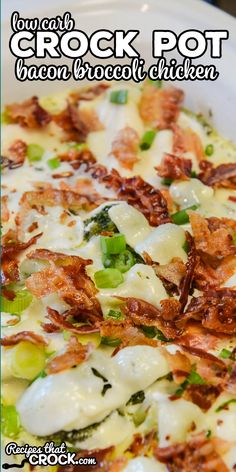 a close up of a plate of food with broccoli and cheese on it