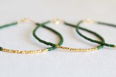 Gold vermeil bracelet - beaded bracelet - christmas bracelet - christmas gift - Friendship bracelet This Dainty Bracelet is very elegant and delicate perfect for a christmas gift or a special day or for an everyday look!!You can wear it alone or stack it with bracelets!!It can make a perfect gift for your bridesmaids!! It is made with: ✪ Tiny Seed Beads, you can choose your color!! ✪ Tiny gold vermeil faceted nugget beads ( Pure silver. ✪ Gold plated clasp. The measurement is aprrox 17cm but you Green Beaded Chain Bracelet For Gift, Green Beaded Bracelet For Gift, Green Beaded Chain Bracelets As A Gift, Green Beaded Chain Bracelet As Gift, Festive Tiny Beads Bracelets, Gold Beaded Chain Friendship Bracelets As Gift, Green Beaded Chain Bracelets For Jewelry Making, Green Beaded Chain Bracelet For Jewelry Making, Gold Bracelet Jewelry For Holidays