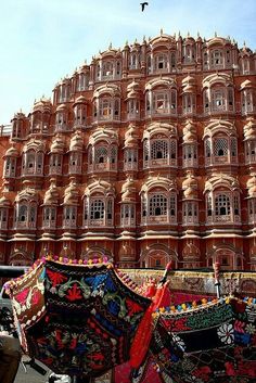 an ornate building with many windows and decorations