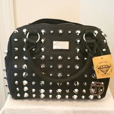 New Black With Silver Stud Design All Over. The Hand Bag Has Two Side Pockets , One Zipper Pocket On The Inside And Open Pockets On The Inside. Handbag Has A Working Zipper Closure And Comes With A Adjustable Strap. Black Studded Purse, Alternative Beauty, Fancy Handbags, Stud Design, Studded Purse, Wearing All Black, Phone Holster, Fringe Bags, Rain And Snow Boots