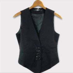 Color: Black Double Button Up Waistcoat 80% Cotton/20% Polyester Model Is 5’7” Wearing A Medium. In My Opinion This Run Small So Recommend Sizing Up. * T Shirt For Sale Under Separate Listing* Business Vest With Button Closure For Fall, Business Vest With Buttons For Fall, Fall Business Vest With Button Closure, Fall Office Vest With Button Closure, Tailored Black Vest With Button Closure, Winter Workwear Vest With Buttons, Fall Business Casual Vest With Buttons, Formal Winter Vest With Buttons, Winter Formal Vest With Buttons