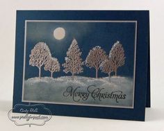 a christmas card with trees and the words merry christmas on it's front side