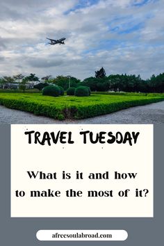 an airplane flying over a lush green field with the words travel tuesday written below it