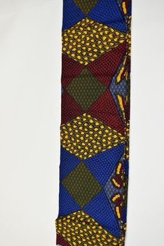 This Multicolor African Fabric is high quality African print made from 100% cotton and it's 45 inches wide. It is used for making African Clothing, African quilts, & For Home decoration. FYI: Print is Double sided. The listing is for 1, 6 yards and Headwrap Each piece of fabric measures: 36in by 45in for 1 yard 216in by 45in for 6 yards 70in by 22in for Head wrap If you purchase more than one yard, you will receive one continuous piece. *If you require more than what I have listed, feel free Traditional Green Fabric With Colorful Pattern, Green Traditional Fabric With Colorful Pattern, Multicolor Ankara Fabric With Block Print, Blue Ankara Print Fabrics, Ankara Fabric With Abstract Pattern, Ankara Fabric With Vibrant Patterned Print, Printed Yellow Ankara Fabric, Clean And Press, Vibrant Patterned Ankara Fabric