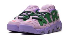 The AMBUSH x Women’s Nike Air More Uptempo Low “Lilac" is a collaboration by the popular luxury jewelry brand and Nike on a contemporary-looking version of the retro basketball sneaker.  The Air More Uptempo Low is the modified low-top version of the ‘90s basketball shoe that was most notably worn by Scottie Pippen with the Chicago Bulls in 1996.  AMBUSH’s take on the silhouette updates its design with a Lilac-colored nubuck construction and oversized, graffiti-inspired Apple Green “AIR” branding on the sides.  A University Red Swoosh is embroidered on the toe.  “AMBUSH” branding appears on the tongue and heel of the midsole.  Additional details include green laces, a pull tab on the heel, and a dark Lilac-colored rubber outsole.  Release date: October 6, 2023 90s Basketball Shoes, Nike X Ambush, Lilac Shoes, Nike Uptempo, 90s Basketball, Nike Air More Uptempo, Nike Air More, Scottie Pippen, Retro Basketball