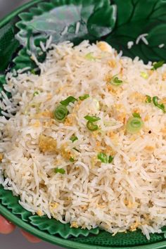 garlic rice in a green bowl with text overlay