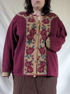 A vintage hand-embroidered Jantzen cardigan with cascading flowers in autumnal shades of red, orange, and green. No material tag,  but feels like a likely cotton ramie blend (and this tracks with similar sweaters from this brand from the same time period). No size tag, but fits like a 2X/3X.  PTP: 27" Length, from shoulder: 28" Cascading Flowers, Flower Sweater, Orange And Green, Printed Cardigan, Time Period, Fall Flowers, Shades Of Red, Flower Print, Cardigans For Women