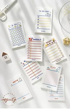 several planner stickers on top of a table