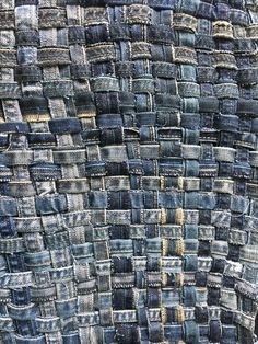 the back side of a piece of cloth made out of old denims and other material