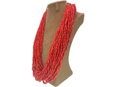 An exceptional example of Konyak Naga tribal glass seed bead necklace.  The Konyak Naga tribe based in North-East India hand-make pieces like this.  Made from hundreds of coral coloured glass beads threaded on a natural thread which is then delicately woven at each end to create a loop clasp.  It is a weighty piece at 250g and feels lovely to wear. The condition is excellent for a piece of this age. Measurements: 70cm in length weighing 250g. My collection of high-quality vintage jewellery and c Traditional Red Coral Beaded Necklace With Colorful Beads, Red Handwoven Necklaces With Round Beads, Traditional Coral Beaded Necklaces With Colorful Beads, Traditional Multi-strand Red Coral Beaded Necklace, Artisan Red Handwoven Beaded Necklaces, Artisan Red Beaded Necklaces Handwoven, Red Fair Trade Jewelry With Round Beads, Red Handwoven Beads For Jewelry Making, Red Fair Trade Beaded Necklace As Gift