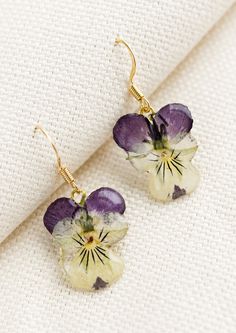 A pair of earrings made from dried viola flowers. Resin Flower Jewelry, Dried Flower Earrings, Dried And Pressed Flowers, Resin Flowers, Small Pouches, Earring Sale, Floral Earrings, Silver Pieces, Flower Jewellery