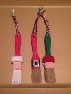 three christmas decorations made to look like toothbrushes