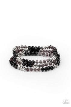 Infused with faceted silver beads, a glamorous collection of sparkly black crystals and smoky beads are threaded along stretchy bands around the wrist, creating glittery layers.

Sold as one set of three bracelets. Bling Party, Black Bracelets, Paparazzi Accessories, Paparazzi Jewelry, Black Crystals, One Set, Black Stretch, Jewelry Party, Cute Jewelry