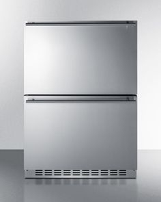 a stainless steel refrigerator freezer sitting on top of a counter