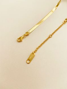 LONG LASTING AND DURABLE FREE SHIPPING ON ALL U.S ORDERS SAFE AND SECURE ONLINE SHOPPING MATERIALS: - Thick 18k gold layer on 925 sterling silver DETAILS: - Length: 16" - Width: 2.5mm - Weight: 5.5-5g CARING INSTRUCTION: **Sterling Silver is a very soft material which can be bent easily, a slight bend of the earring needle is considered normal** - Our jewelry are made of sterling silver. It is a metal that is very soft and tarnishes very easily. It is the natural characteristic of the metal. If Adjustable Tarnish Resistant Yellow Gold Chain Necklace, Gold Sterling Silver Lariat Chain Necklace, Classic Gold Lariat Chain Necklace, Formal Gold Sterling Silver Chain Necklace, Adjustable Gold-toned Sterling Silver Chain Necklace, Adjustable Sterling Silver Gold Chain Necklace, Gold Sterling Silver Chain Necklace With Adjustable Chain, Adjustable Gold Sterling Silver Chain Necklace, Gold Sterling Silver Box Chain Bracelet