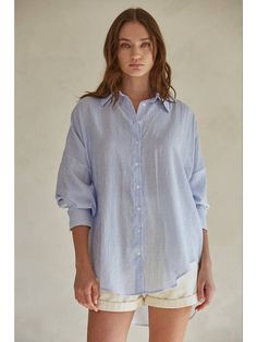 Stay cool and chic this summer with our All Day Shirt in Blue Stripe. Perfect for layering, this relaxed fit button down is the ultimate addition to your wardrobe. Embrace the summer vibes and effortlessly elevate your style. 86% Rayon, 12% Polyester, 2% Nylon Relaxed Button-up Shirt With Rolled Sleeves, Spring Beach Shirt With Button Closure, Light Blue Button-up Beach Tops, Light Blue Button-up Top For Beach, Light Blue Summer Shirt With Button Closure, Relaxed Blue Summer Shirt, Casual Blue Tops With Rolled Sleeves, Spring Beach Button-up Shirt, Casual Blue Top With Rolled Sleeves