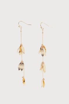 If you feel like your outfit needs a little extra bling, the Lulus Glowing Choice Gold Floral Drop Earrings are always the right move! Shiny, gold-toned metal shapes these decadent earrings that are composed of slender, dangling chains that support petal-like charms formed into floral shapes. Fishhook backs. 4" Long. 80% Steel, 20% Brass. Imported. Lulus | Glowing Choice Gold Floral Drop Earrings. Gold-tone Dangle Hoop Earrings For Party, Gold-tone Metal Earrings For Party, Glamorous Gold-tone Metal Earrings, Yellow Gold Metal Linear Earrings For Party, Yellow Gold Linear Earrings For Party, Gold Brass Linear Earrings For Party, Gold-tone Metal Drop Linear Earrings, Glamorous Gold Linear Earrings, Glamorous Gold Dangle Linear Earrings