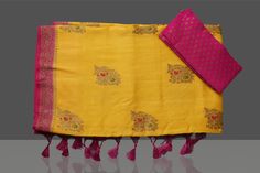 Gorgeous yellow muga Banarasi saree is a captivating choice for festivals and pre-wedding occasions! It is enhanced with contrasting pink antique zari border and pallu. It comes with a pink blouse piece. Shop Banarasi sarees in USA from Pure Elegance. The shown stitched blouse on the model is for display purpose only. The saree comes with a matching blouse piece and finished with fall and piko. The actual product may vary slightly from the image. These are custom orders, hence expect slight vari Yellow Banarasi Silk Traditional Wear With Border Detail, Festive Yellow Traditional Wear With Border, Bollywood Style Yellow Dupatta With Border, Yellow Art Silk Traditional Wear With Border, Yellow Katan Silk Traditional Wear With Border, Yellow Paithani Silk Traditional Wear With Border, Yellow Katan Silk Saree With Border, Yellow Paithani Silk Saree With Border, Yellow Banarasi Silk Saree With Border