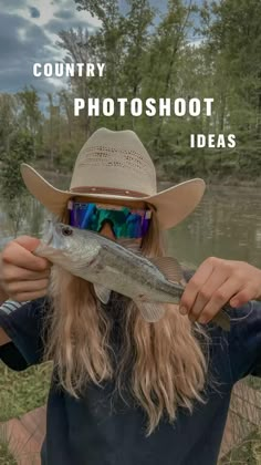 a man with long hair wearing a cowboy hat and sunglasses holding a fish