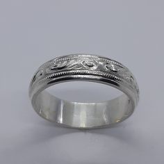 This stunning handmade/hand engraved unisex/any occasion band has been carefully crafted in solid 925 sterling silver. This beautiful band will not go unnoticed. Ring is size 9 but can be resized at no extra cost. A personalized message can be added to the inside of the ring such as your special date or any other message. All of my jewelry is handmade from scratch, one item at a time, as I like to produce a high quality piece. Ring will be shipped to you in an elegant gift box. A tracking shippi Silver Engraving, Mens Ring, Have A Blessed Day, Hand Engraving, Elegant Gift, Silver Band, Solid 925 Sterling Silver, Ring Verlobung, Wedding Rings Engagement