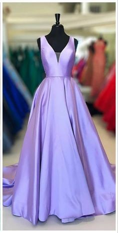 Purple V-neck Prom Gown, Purple Floor-length Ball Gown With Sweep Train, Purple Gown For Prom Season, Purple V-neck Gown For Prom, Purple Floor-length Ball Gown For Prom Season, Purple Ball Gown Evening Dress With Sweep Train, Purple Dresses With Sweep Train For Prom Season, Purple Floor-length Ball Gown For Prom, Purple Dresses With Sweep Train For Prom