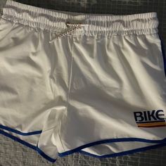 Bike Men Swimsuit/Track Shorts Size Medium With Liner 4 Way Stretch White White Three-stripes Gym Shorts, Sporty White Moisture-wicking Swim Trunks, Men Swimsuit, White Moisture-wicking Mesh Athletic Shorts, White Nylon Athletic Shorts With Built-in Liner, White 4-way Stretch Activewear Shorts, Man Bike, Track Shorts, Shorts Athletic