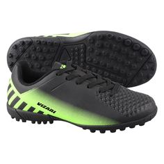 a pair of black and green soccer shoes