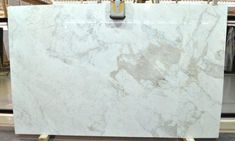 a large white marble slab in a store