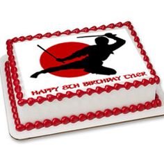 a birthday cake with the image of a baseball player holding a bat on top of it