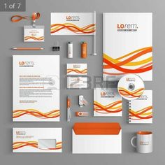 stationery set with orange and white waves on the gray background, including business cards, envelope