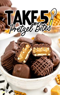 a bowl full of chocolate covered pretzels with the words take 5 pretzel bites