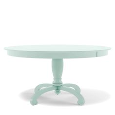 a white table with an oval shaped top