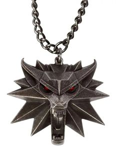 Can you feel it?There's danger in the air.. Alert your friends of danger with our Witcher Wolf pendant with glowing LED eyes. Medallion measures approximately 2 inches wide, 1.75 inches tall, 1 inch deep; Chain measures approximately 30 inches in length Officially licensed by CDPR for The Witcher, created by J!NX Pendant made from a High quality magnesium metal alloyEyes light up red LEDs with back on/off switch (includes Replaceable battery)Ages 15 and up adult collectible, not a toy In STOCK ready to ship.. Shipping in the Continental US is via USPS Ground Select with a transit time of 3-8 days. Faster shipping may be available please leave me a message in the checkout to see if your Item/s qualify. Witcher Necklace, Witcher 3 Geralt, Medallion Jewelry, The Witcher Wild Hunt, Necklace Hanger, Witcher 3 Wild Hunt, Wolves Pendants, Head Necklace, Wolf Jewelry