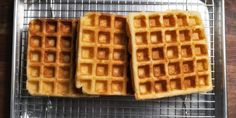 three waffles sitting on top of a metal pan