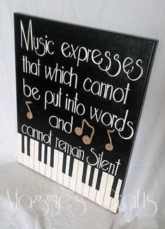 a sign that says music expressess that which cannot be put into words and can't remain silent