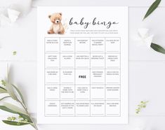 a baby shower game with a teddy bear on it