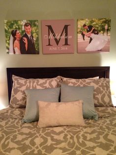 a bed with two pictures on the wall above it and a couple's initials