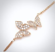 Butterflies represent a passionate bond and endless love. Perfect for a butterfly-themed wedding, this delicate bracelet is an ideal accessory for the minimalist bride, or can make a thoughtful gift for your young bridesmaids or flower girls. Adorned with flawlessly faceted cubic zirconia, it captures the light from every angle with a perfectly translucent appeal, sparkling beautifully. All it takes is a simple glance at this beautiful design to see its extremely subtle and classy look that make Minimalist Bride, Endless Love, Flower Girls, Bracelet Silver, Themed Wedding, How To Look Classy, Silver Rose Gold, Adjustable Bracelet, Silver Bracelets