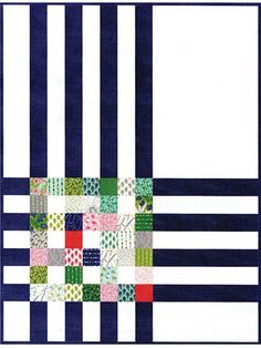 a blue and white striped quilt with different colored squares