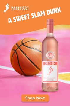 a bottle of pink wine next to a basketball on a court with the words, sweet slam dunk