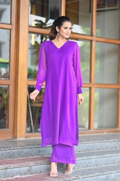 PRODUCT DESCRIPTION:-Let your personal style speak about your personality ,As you look absolutely gorgeous in our Purple Chiffone Co-Ord set.Kurta Fabric :- ChiffonPant Fabric :- ChiffonColor:-PurpleCare Instructions :- Dry clean onlyModel Size :- Model is wearing XS sizeModel Height :- 5.5''DISCLAIMER :- Slight color variations may occur due to different screen resolution. Chiffon Sets For Eid Formal Occasion, Unstitched Chiffon Sets For Summer, Summer Formal Georgette Sets, Fitted Chiffon Set With Long Sleeves, Fitted Chiffon Long Sleeve Sets, Chiffon Long Sleeve Sets For Party, Chic Chiffon Long Sleeve Sets, Chic Long Sleeve Chiffon Set, Chiffon Long Sleeve Party Sets